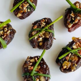 Dates stuffed with onions and nuts.