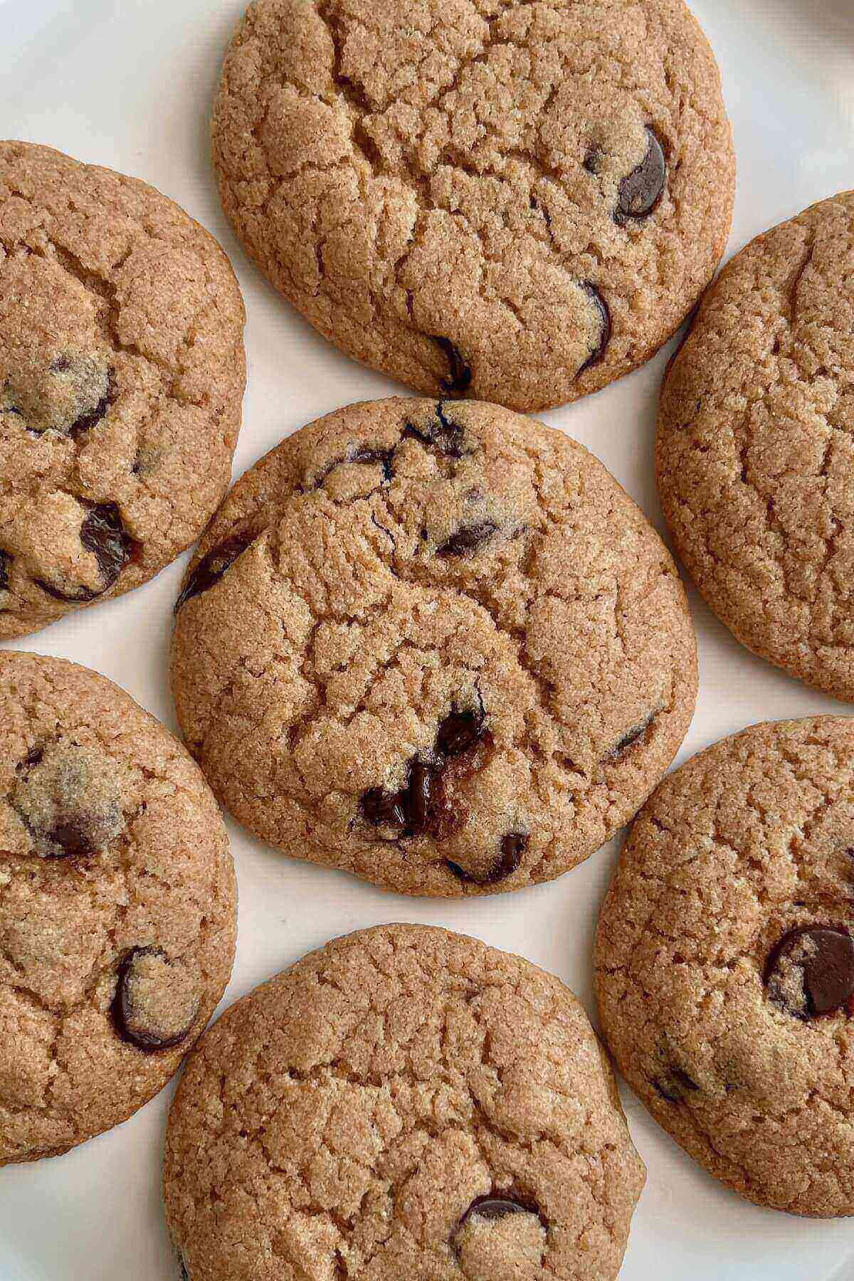 Chocolate chip cookies on a white platter.