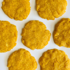 Corn flour cookies on a white plate.