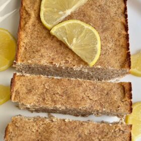 Lemon cake with two thick slices cut.