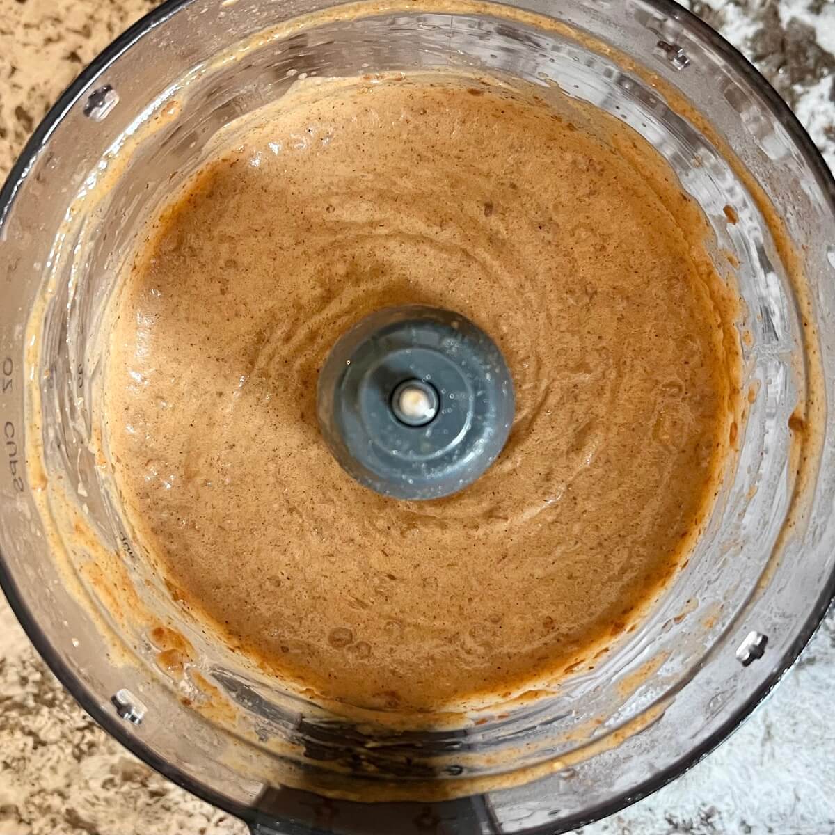 Caramel sauce blended in a food processor.