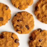 Coconut flour pumpkin cookies on a white plate.
