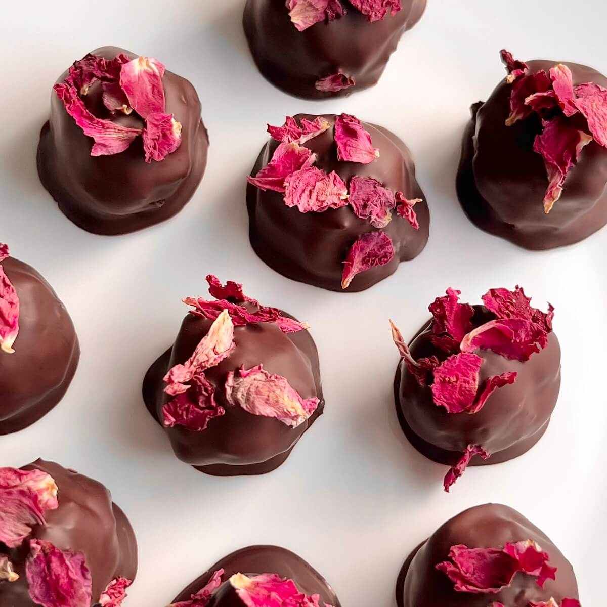 Rose truffles on a white plate.