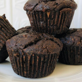 Muffins made with buckwheat on a white plate.