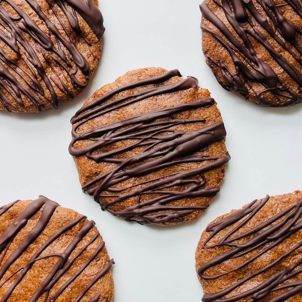 Cookies made with flaxseed on a white plate.