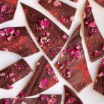 Chocolate bark topped with dried rose petals and freeze-dried strawberry powder.