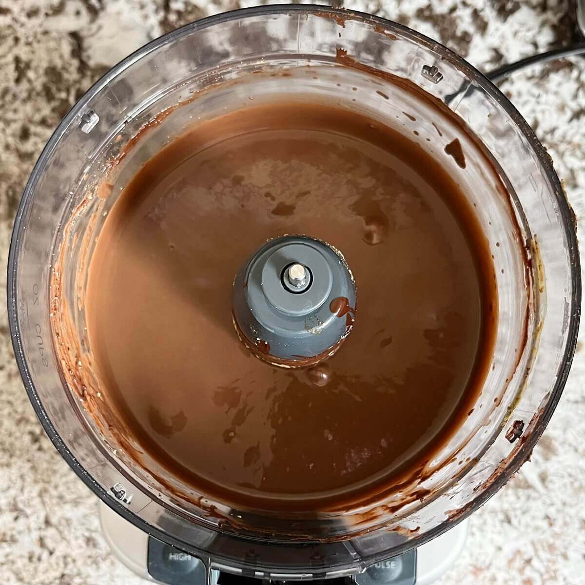 Blended chocolate mousse in a food processor.