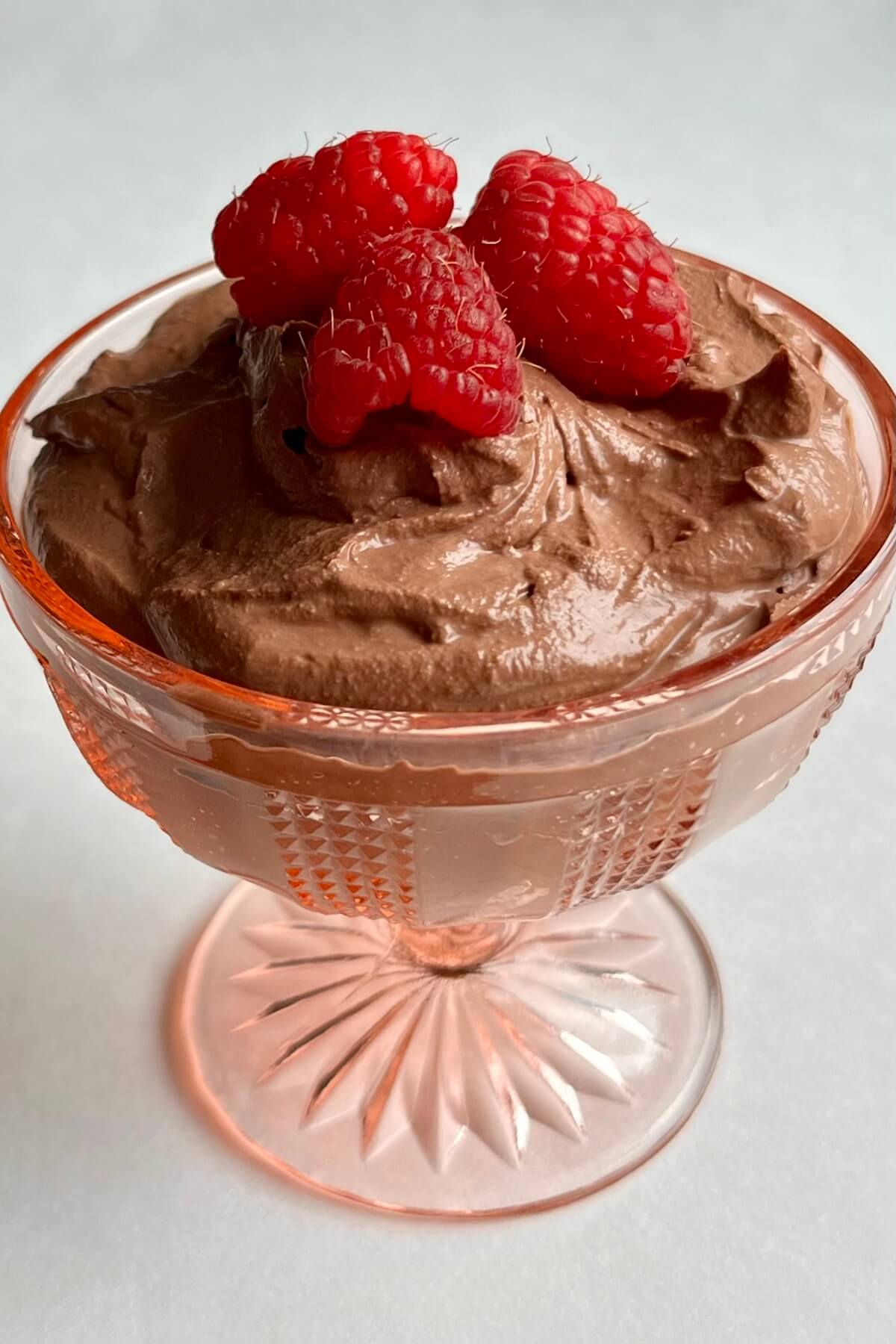 Vegan chocolate mousse in a glass dish.