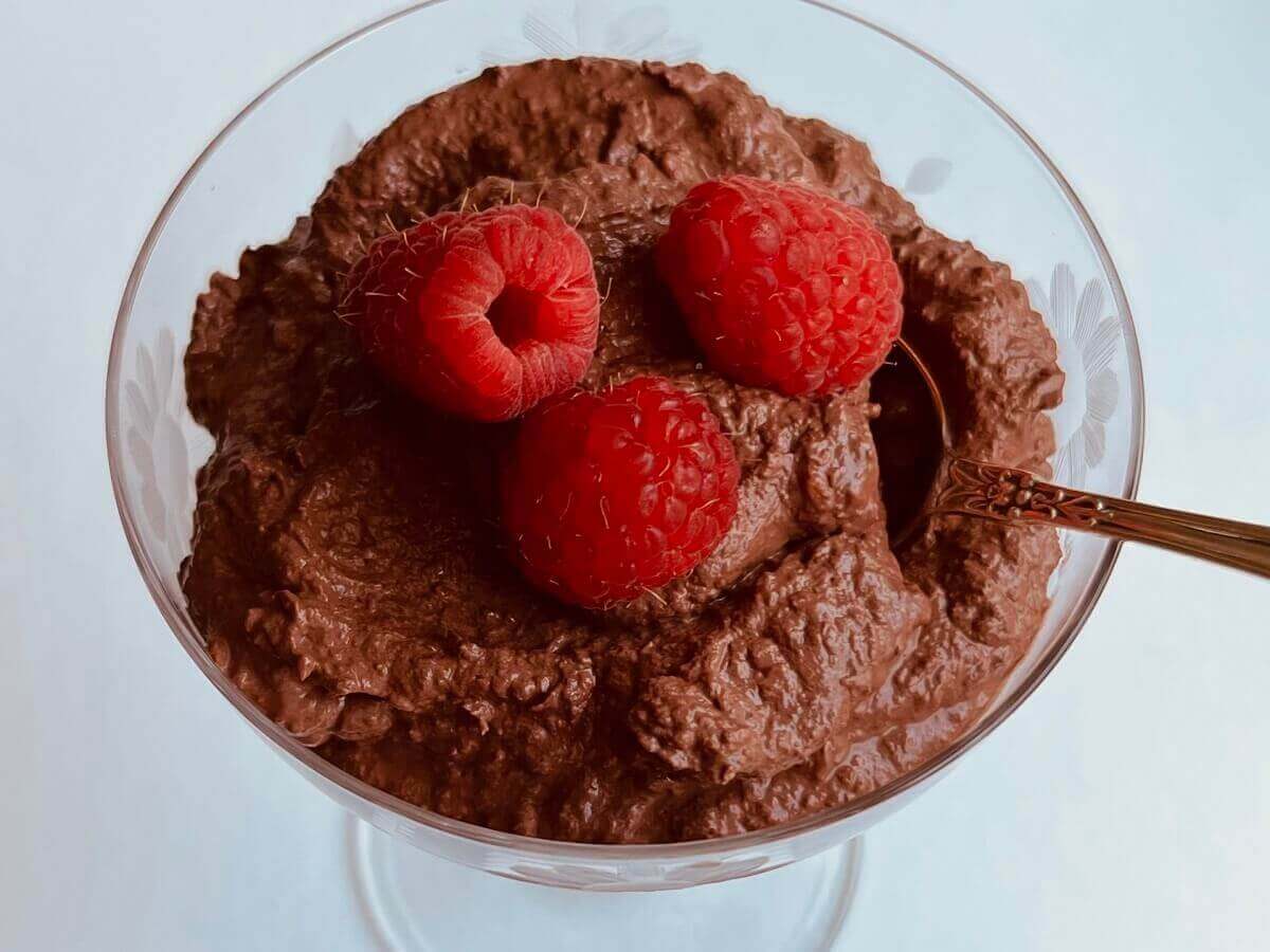 Raspberry mousse in a vintage glass dish.