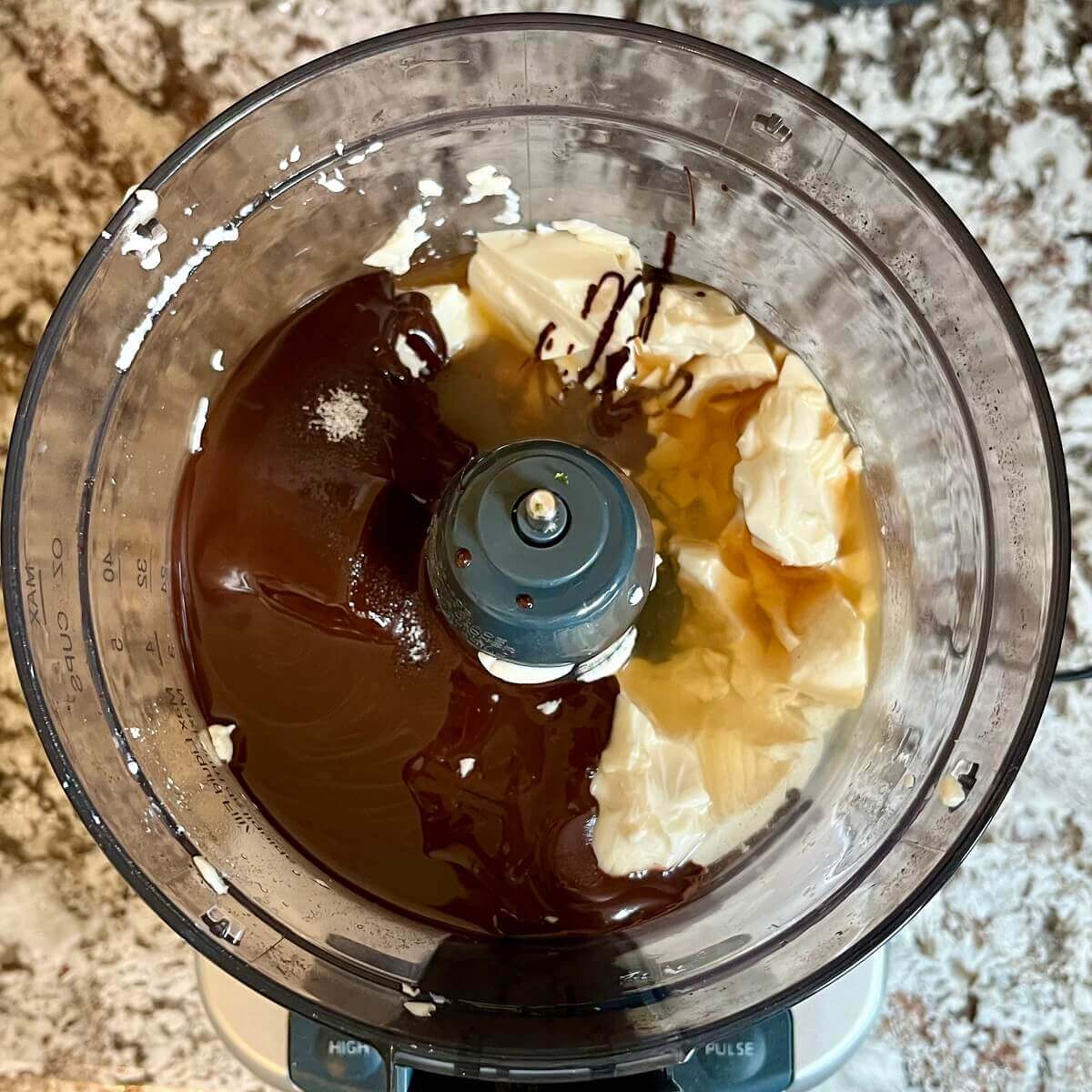 Ingredients for tofu mousse in a food processor.