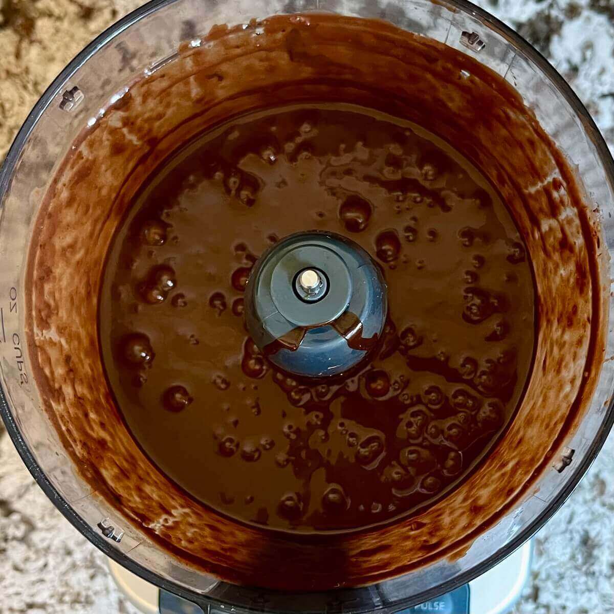 Blended banana mousse in a food processor.