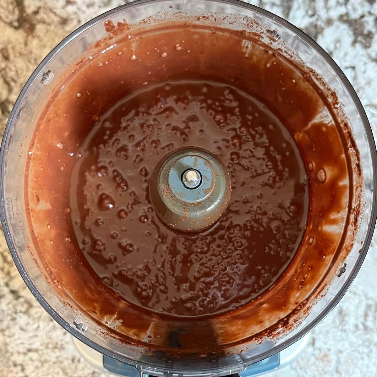 Ingredients for pudding blended in a food processor.