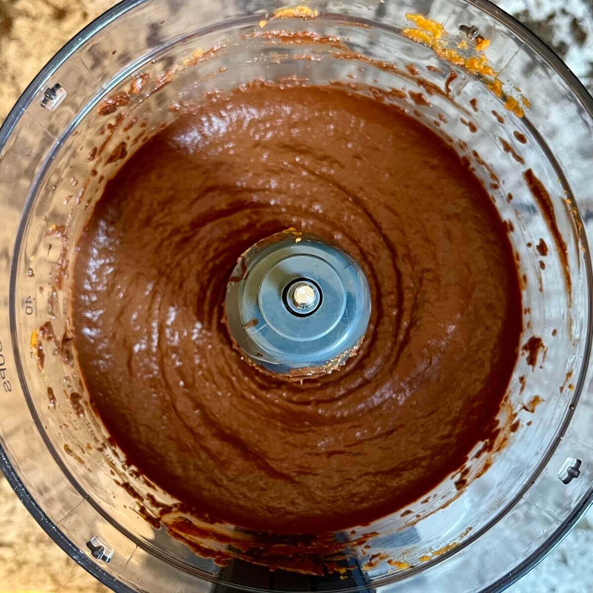 Pumpkin mousse blended in a food processor.