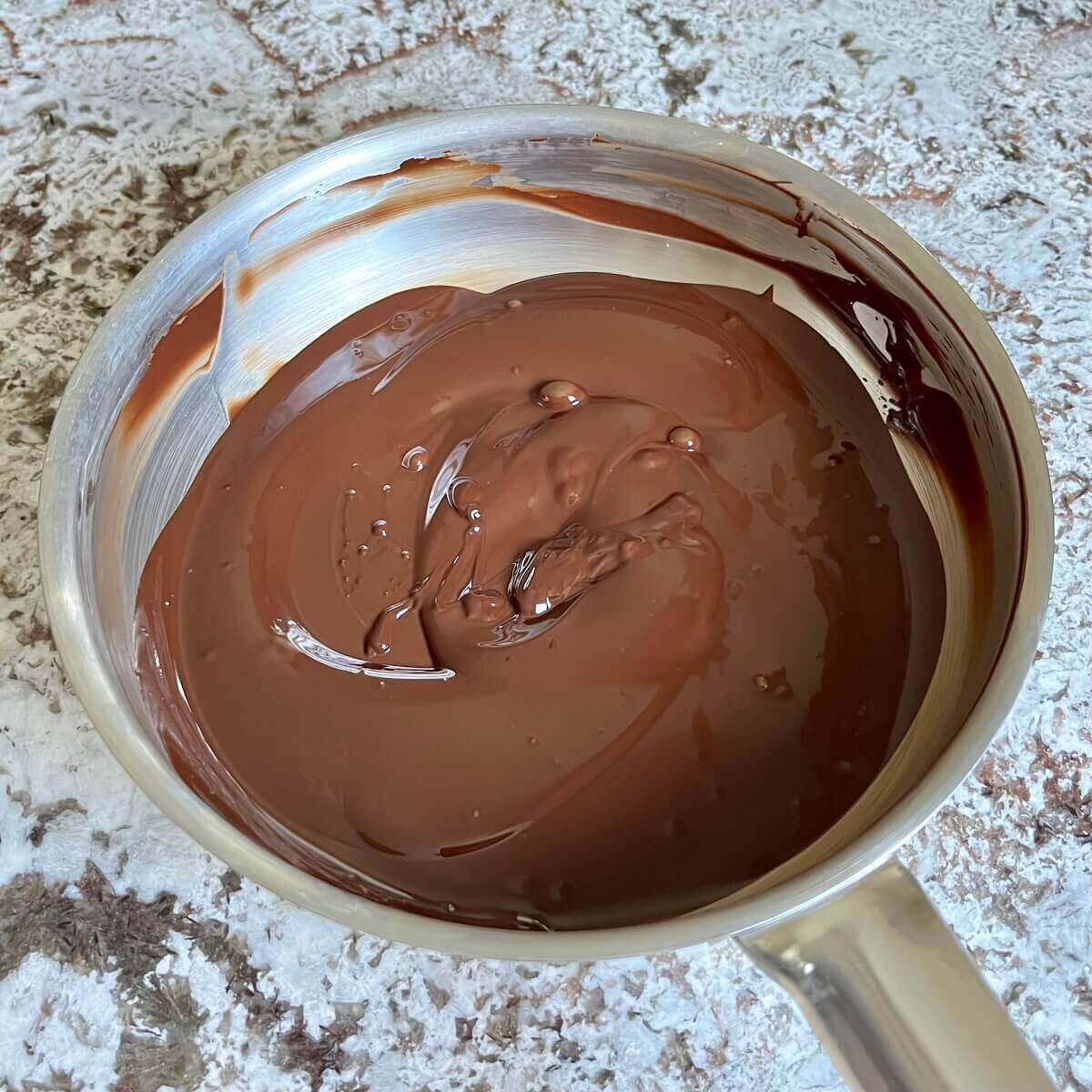 Melted chocolate in a pan.