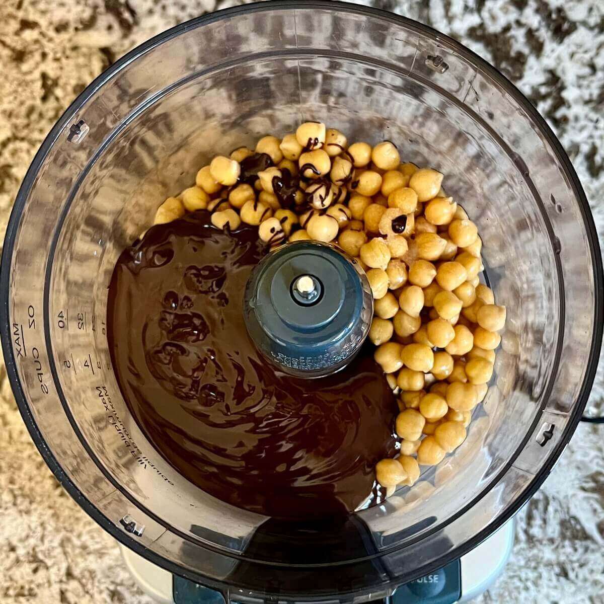 Ingredients for fudge in a food processor.