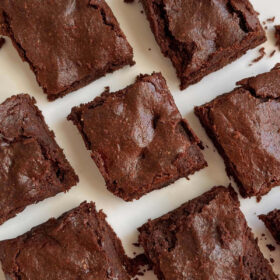 Buckwheat brownies on a white plate.