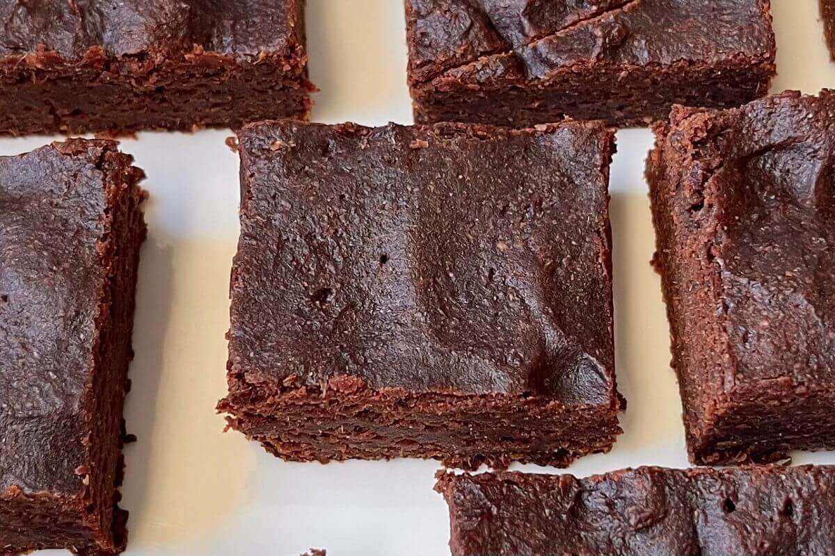 Date sweetened brownies on a plate.