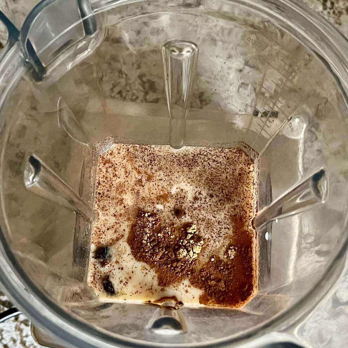 Ingredients for a smoothie in a blender.