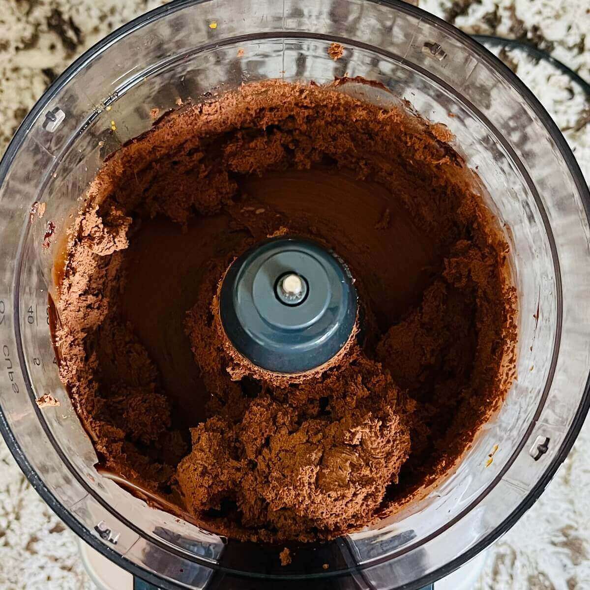 Blended filling for truffles in a food processor.