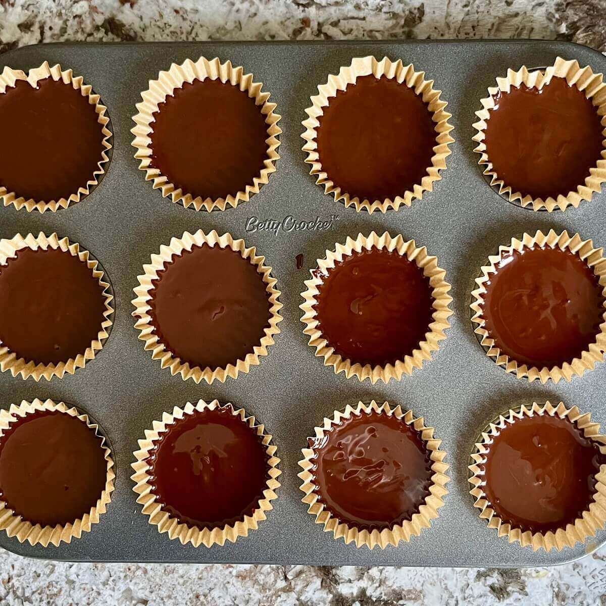 Chocolate lemon treats in a mini muffin pan.