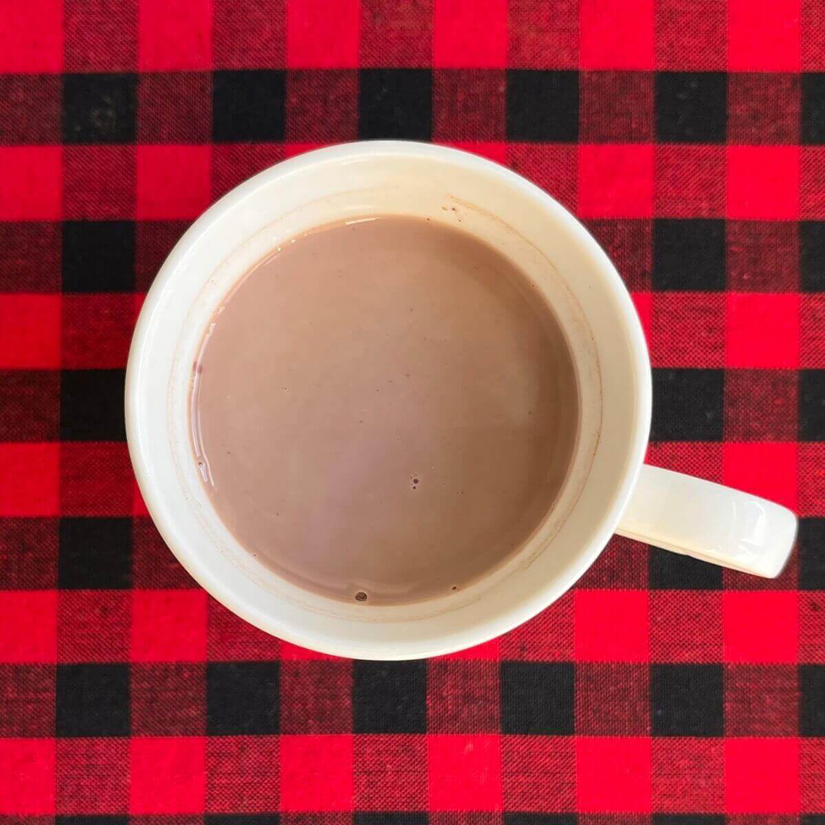 Maple hot chocolate in a white mug.