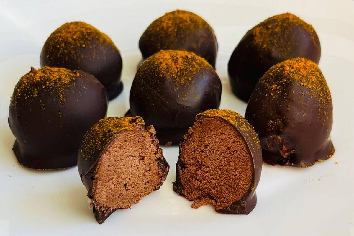 Sweet potato chocolates on a white plate.