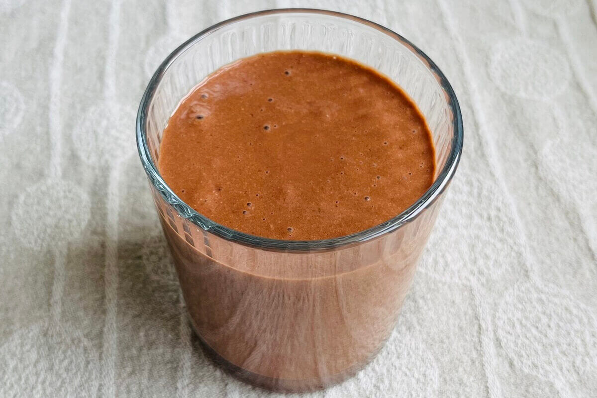 A nut-free smoothie in a glass.