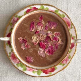 Rose hot chocolate in a teacup.
