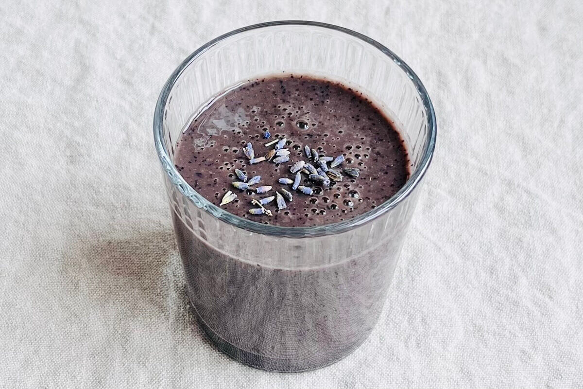 A smoothie sprinkled with dried lavender flowers.
