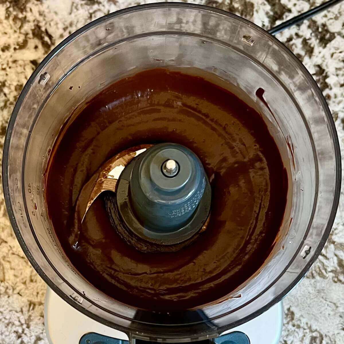 Blended banana and melted chocolate in a food processor.