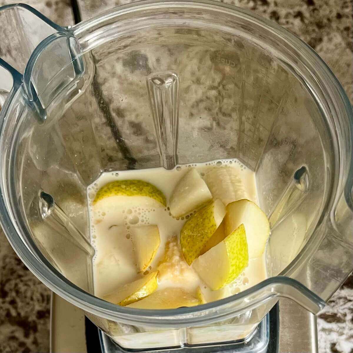 Pear, banana, sea salt, vanilla, and soy milk in a blender.