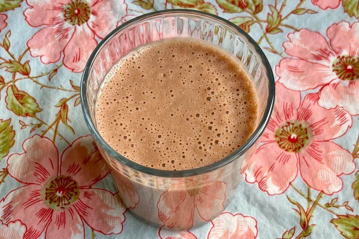 A creamy smoothie in a glass.
