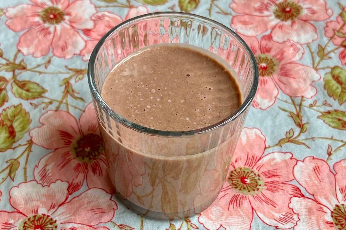 A pumpkin seed shake in a glass.