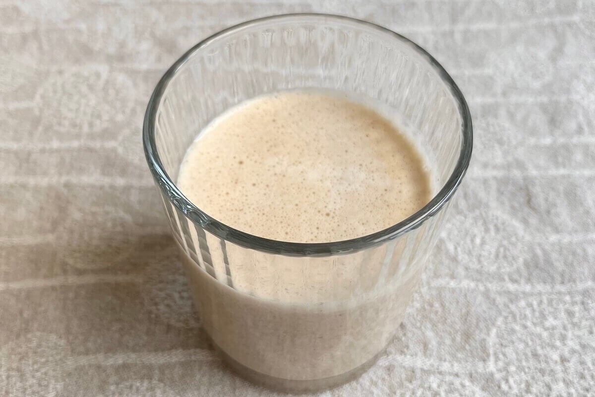 A salted caramel shake in a glass.