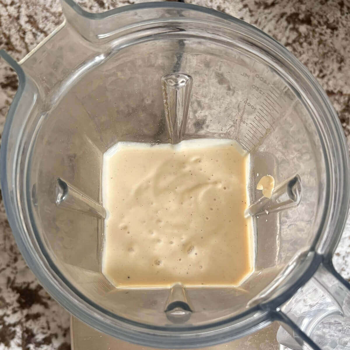 A creamy tofu-based sauce in a blender.
