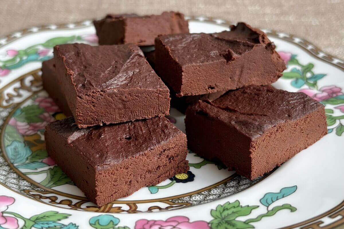 Fudge squares made with sweet potatoes on a vintage plate.