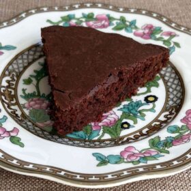 A slice of oat flour cake on a plate.