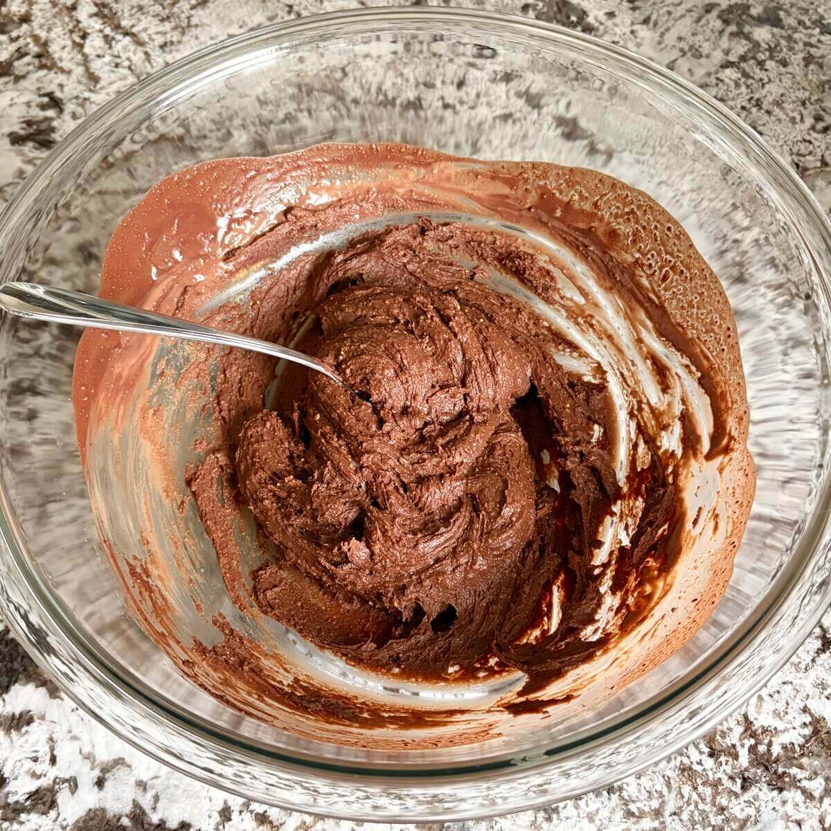 Low-carb chocolate frosting in a mixing bowl.