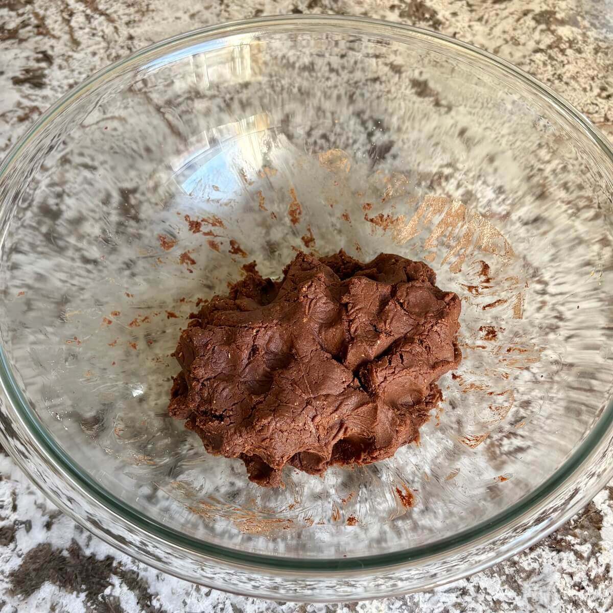 Monk fruit cookie dough in a glass bowl.