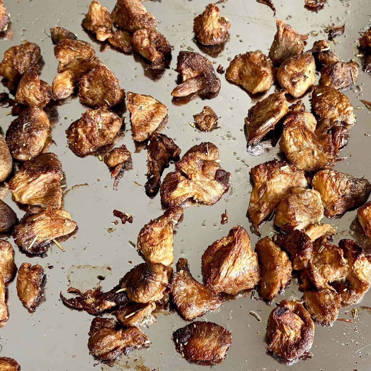 Roasted mushrooms on a sheet pan.