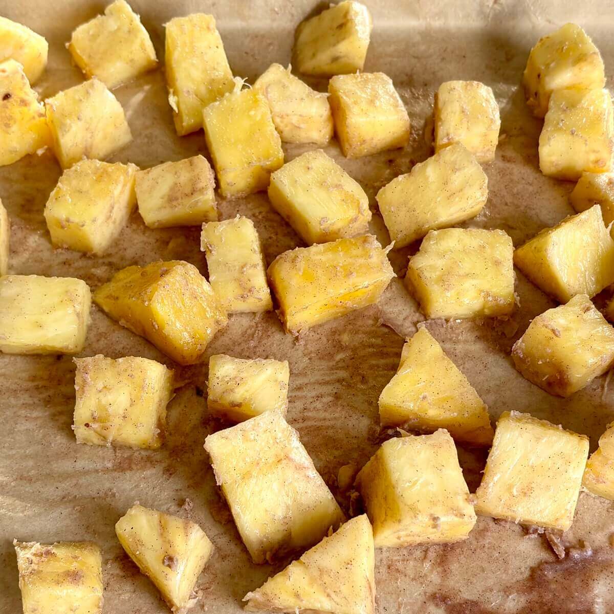 Pieces of raw pineapple tossed with spices and coconut oil.