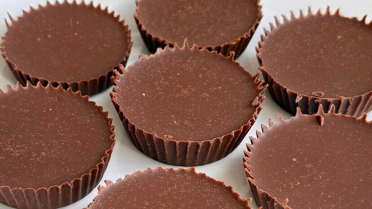 Vegan keto fat bombs on a white plate.