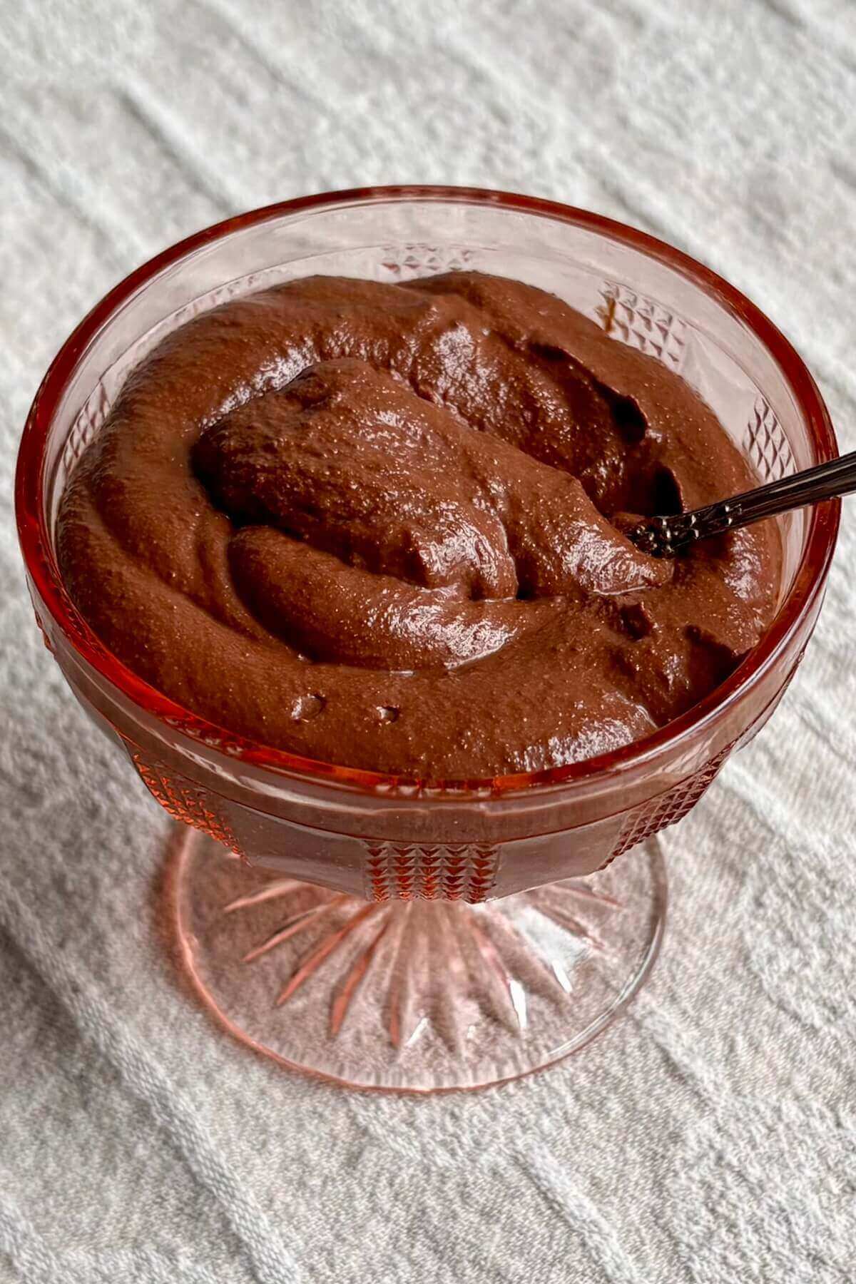 Chocolate pudding made with walnuts in a dish.