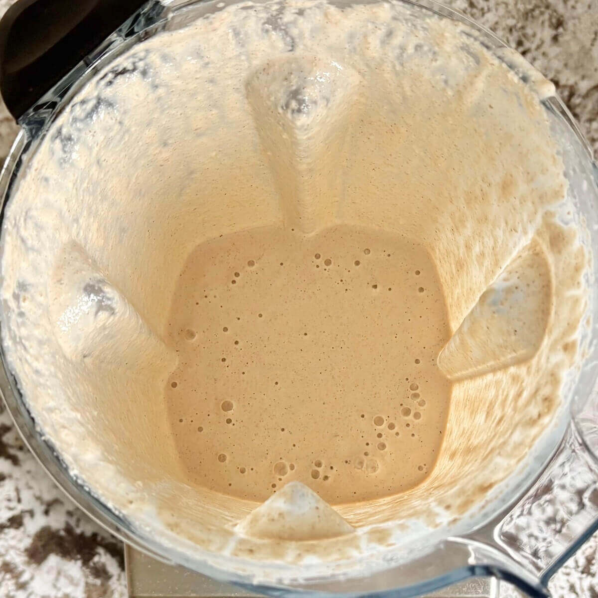 Vegan walnut cream sauce in a blender.