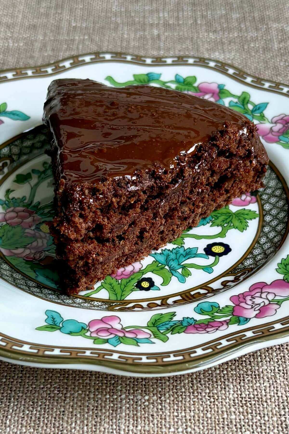 A slice of chia chocolate cake on a plate.