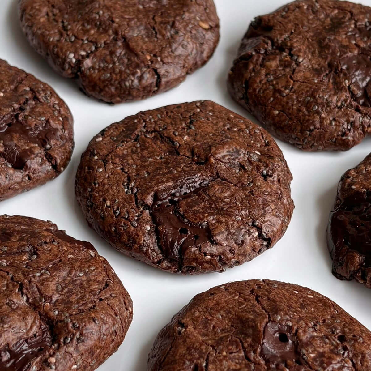 Chia seed cookies on a white plate.