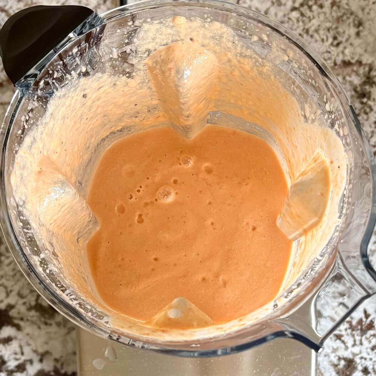 Creamy raw soup in a blender.