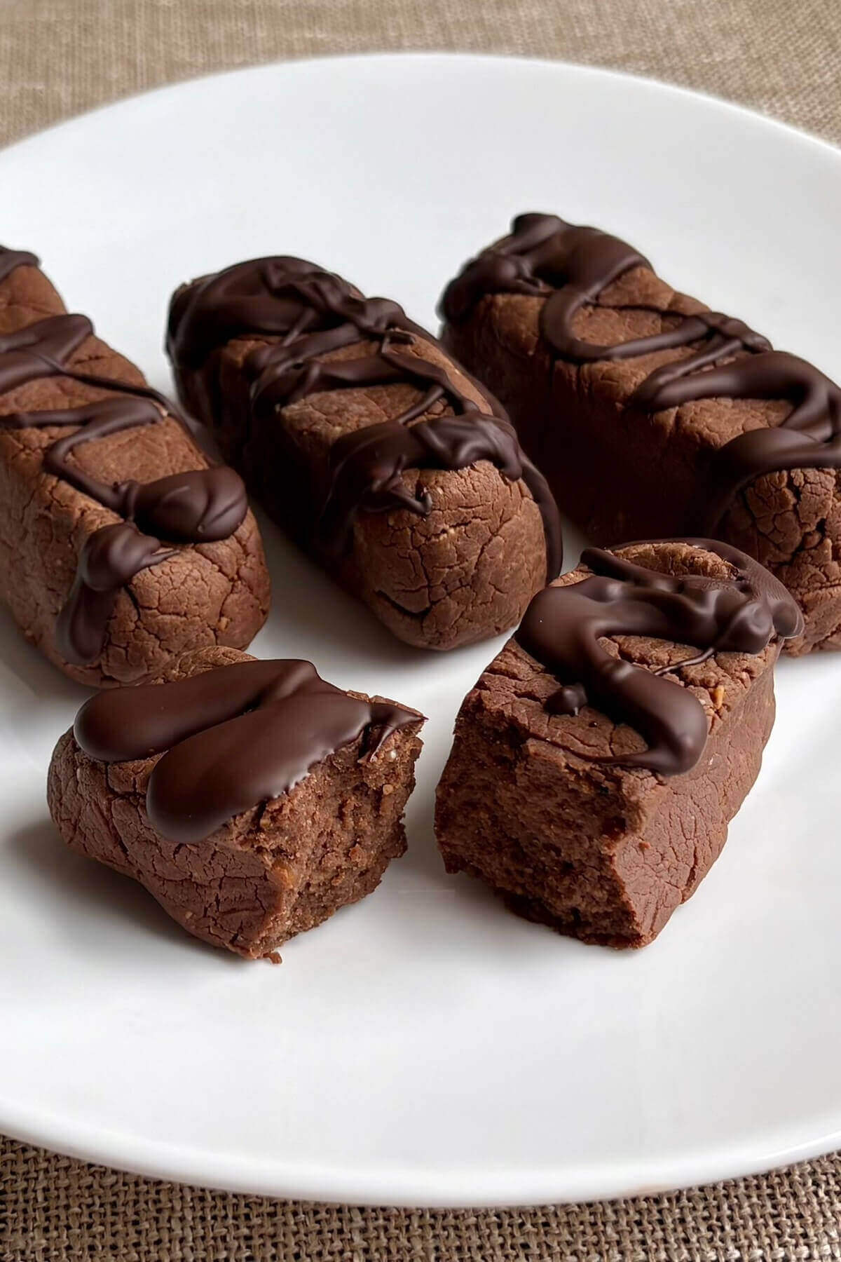 Low carb protein bars on a white plate.