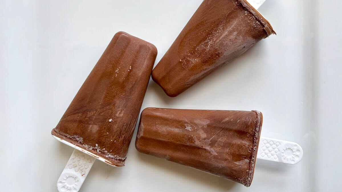 Monk fruit sweetened popsicles on a plate.