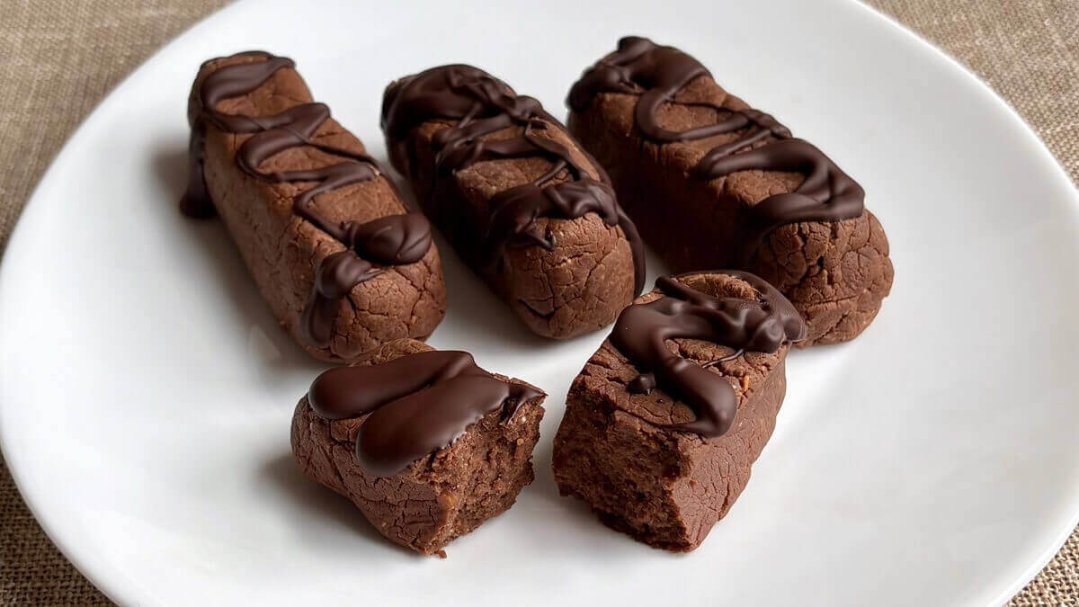 Monk fruit-sweetened protein bars on a white plate.